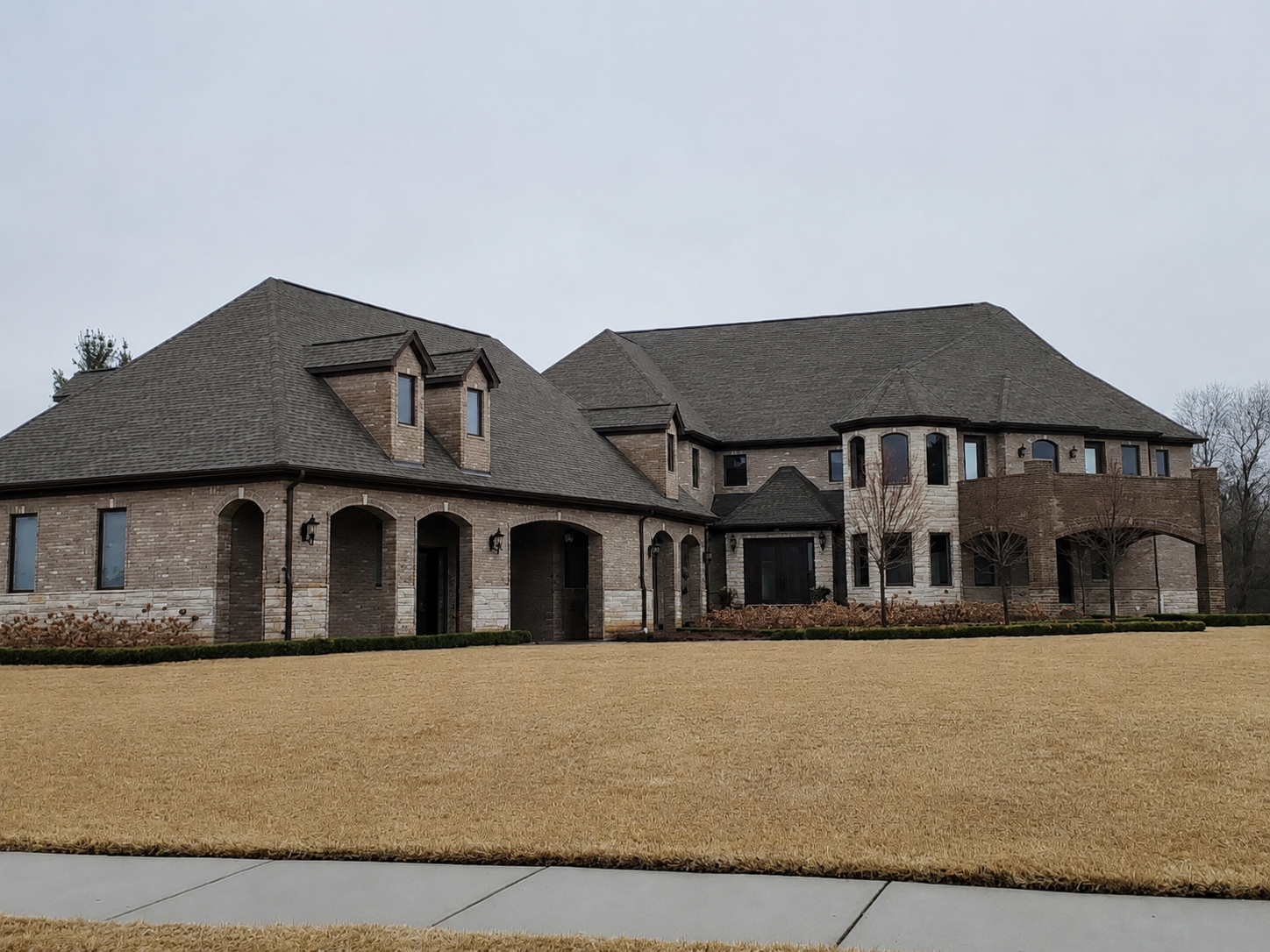 Luxury custom home exterior by Martin & Sons Building